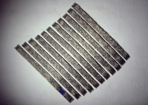 Fotograf: Jens Bull
Værk  titel: Acceleration 
Materiale: Vævet af ståltråd + lidt blå farve 
Størrelse: 200 x 200 cm 